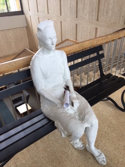 Segal Woman with Sunglasses on Bench